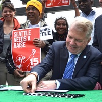 Seattle Enacts Landmark $15/Hour Minimum-Wage Law